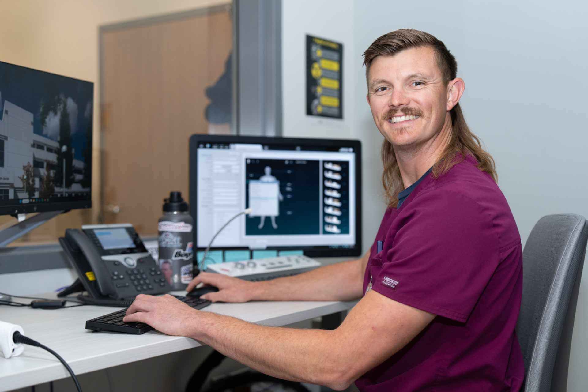 UC Davis Health technologist using a United Imaging workstation at the Folsom Medical Care Clinic